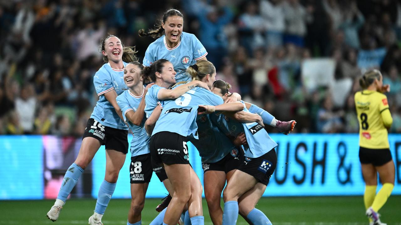 Melbourne City players celebrate.