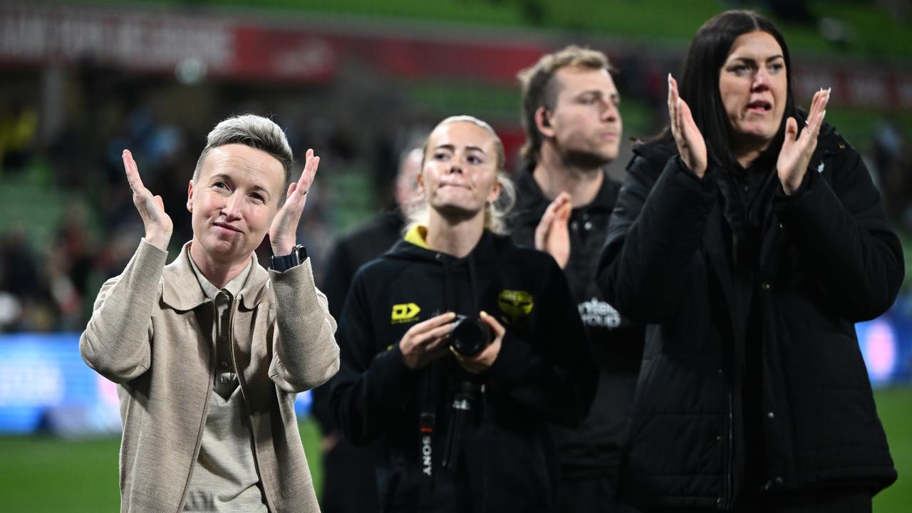 Coach Bev Priestman (left)